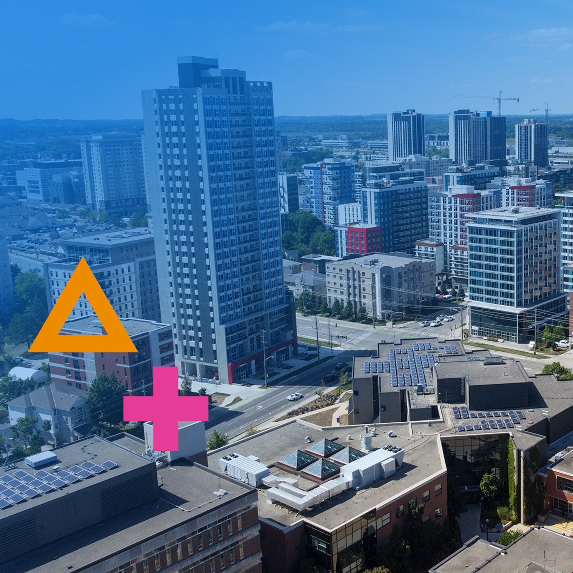 Aerial view of downtown Kitchener-Waterloo with geometric graphics 